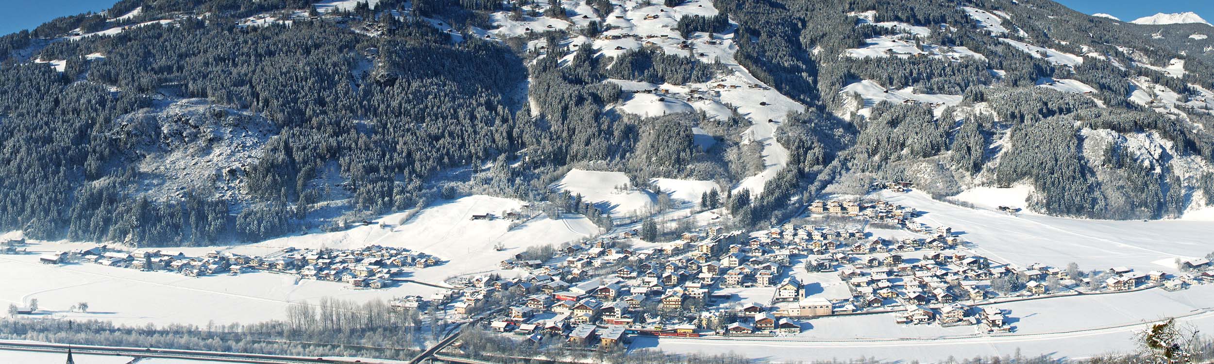 Winter Ortsansicht Aschau©Wörgötter&friends